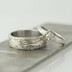 snubní prsten Gordik (velikost 63, šířka 7 mma) a Gordik flower Au s 1,5 mm diamantem (velikost 51, šířka 3 mm) - k 2141