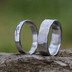 Snubní prsteny chirurgická ocel Natura - vlevo dámský velikost 53,5, šířka 3,5 mm, tloušťka 1,3 mm, profil C, lesklý a vpravo pánský velikost 56, šířka 6 mm, tloušťka 1,5 mm, profil C, matný - V5053+V5047